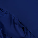 Close-up of smooth, dark blue satin fabric with flowing folds—ideal for crafting the Alessandra Ruffle Maxi Dress by AMANDA UPRICHARD, featuring a graceful halter neckline perfect for any special occasion.