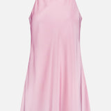 The Calypso Swingy Mini Dress by AMANDA UPRICHARD is a sleeveless, light pink satin mini dress with a high neckline, loose fit, and soft, shiny texture for an elegantly simple look.
