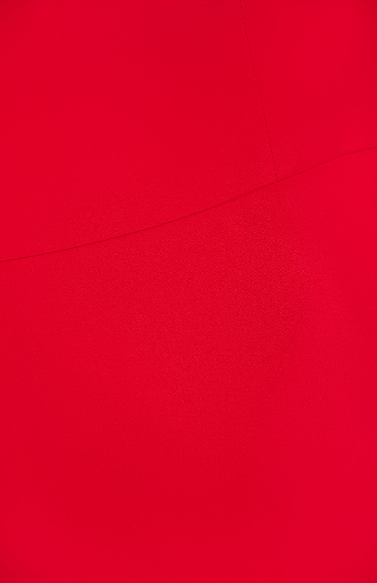 A bold red surface captures the sleek elegance of the AMANDA UPRICHARD Cynthia Midi Neck Tie Dress, featuring minimalistic abstract curves and lines for a modern, refined look.