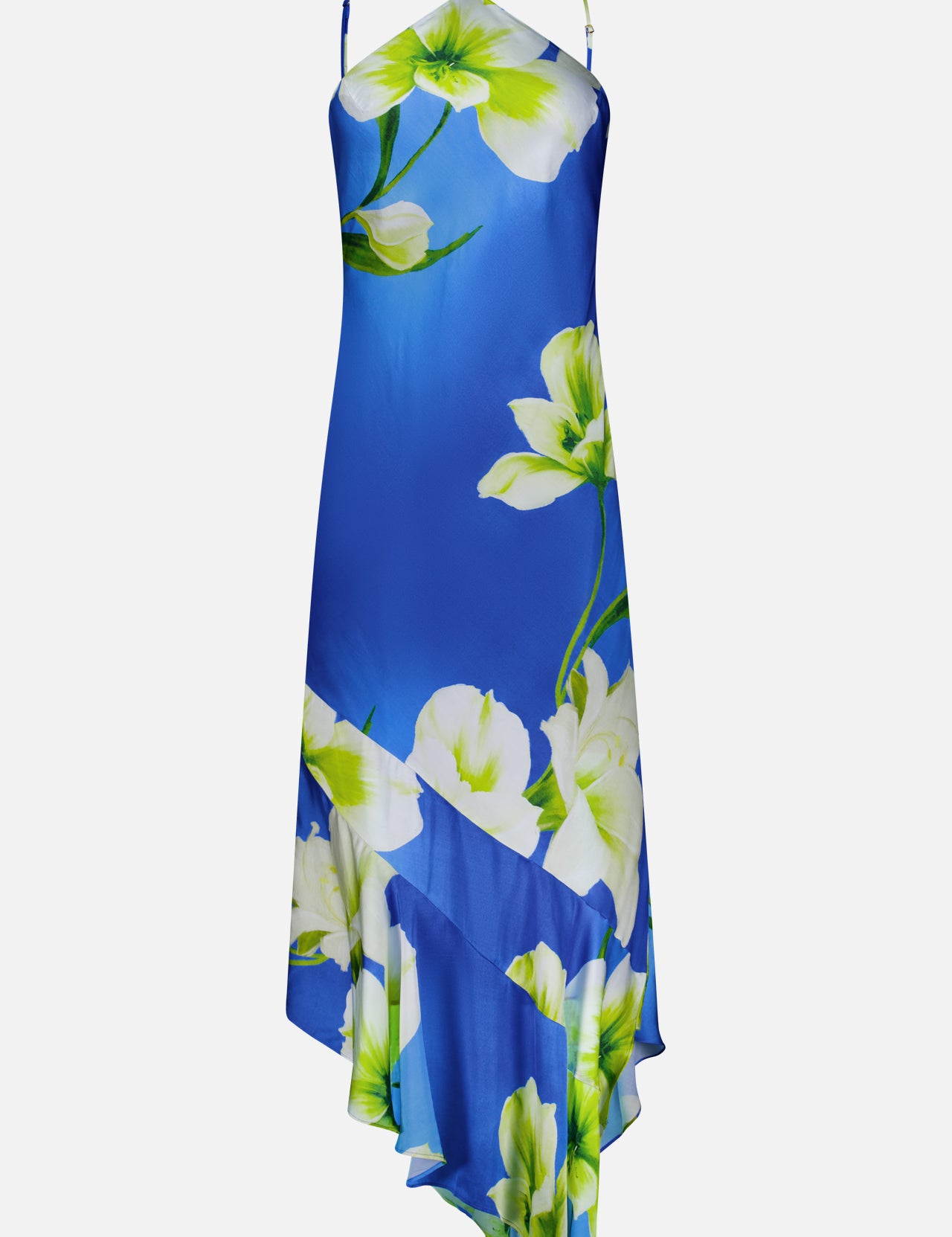 The Gabriella Floral Midi Dress by AMANDA UPRICHARD features thin spaghetti straps, a bold white and green floral print, and an asymmetrical hemline—perfect for making a stylish statement.