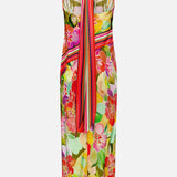 The Irena Scarf Detail Maxi Dress by AMANDA UPRICHARD features a vibrant floral print with red, pink, and yellow blooms, green leaves on a light background, and a colorful striped scarf tie at the halter neck in a fitted sleeveless silhouette.