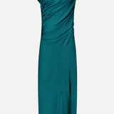 The Jeannine Maxi Dress by AMANDA UPRICHARD features a teal one-shoulder design with ruched detailing and an asymmetrical neckline. Crafted from smooth, slightly shiny satin, this party gown falls to a sleek, elegant knee length.