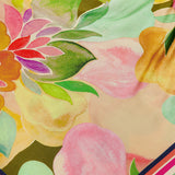 The Keyshia Overlay Mini Dress by AMANDA UPRICHARD features a vibrant abstract floral pattern in pink, yellow, green, and orange with a watercolor effect and bold diagonal red, pink, blue, and white stripes along the border.