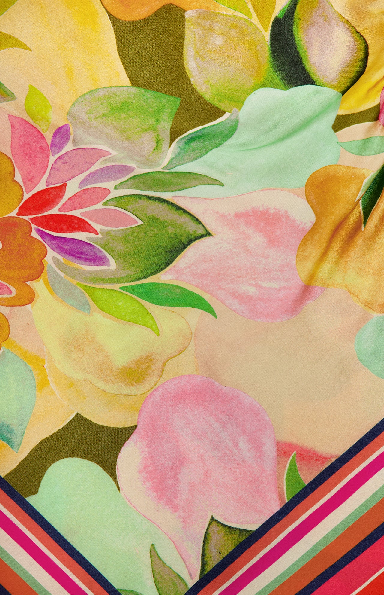 The Keyshia Overlay Mini Dress by AMANDA UPRICHARD features a vibrant abstract floral pattern in pink, yellow, green, and orange with a watercolor effect and bold diagonal red, pink, blue, and white stripes along the border.