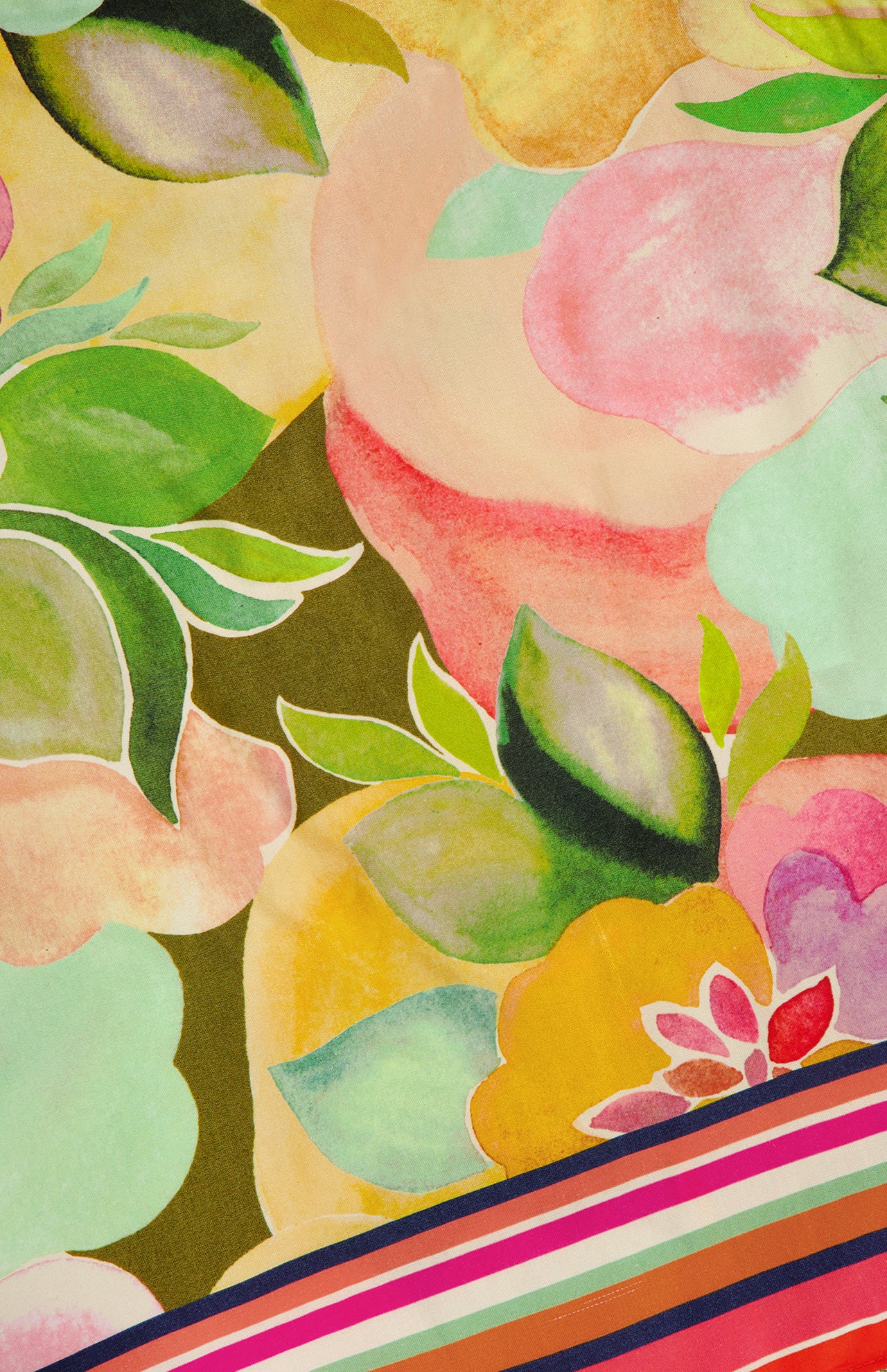 The Keyshia Back Vent Top by AMANDA UPRICHARD features a vibrant abstract floral print with overlapping watercolor flowers and leaves in pink, yellow, green, and purple plus diagonal multicolored stripes—perfect for sunny vacation days.