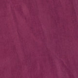 A close-up of deep maroon fabric from the Lyra Midi Dress by AMANDA UPRICHARD, featuring a slightly wrinkled texture and subtle, uneven shading throughout.