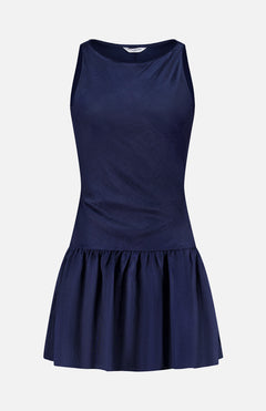 The AMANDA UPRICHARD Margo Drop Waist Skirt Dress is a sleeveless navy linen organza mini dress with a fitted bodice and dropped waist, featuring a gathered flared skirt. Shown against a plain white background.