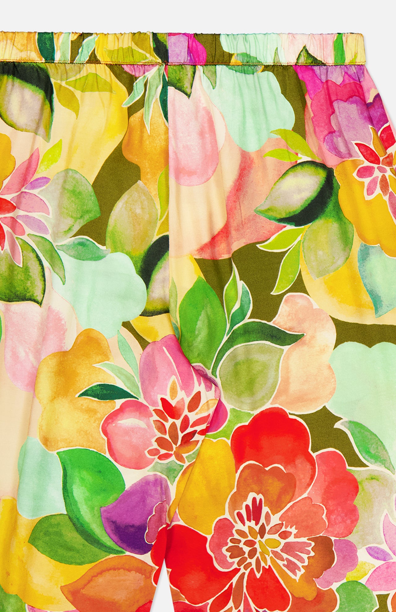 The Mariko Wide Leg Floral Pants by AMANDA UPRICHARD feature a vibrant floral print in red, pink, yellow, purple, and orange with green leaves, a wide-leg silhouette, and an elastic waistband for comfort.