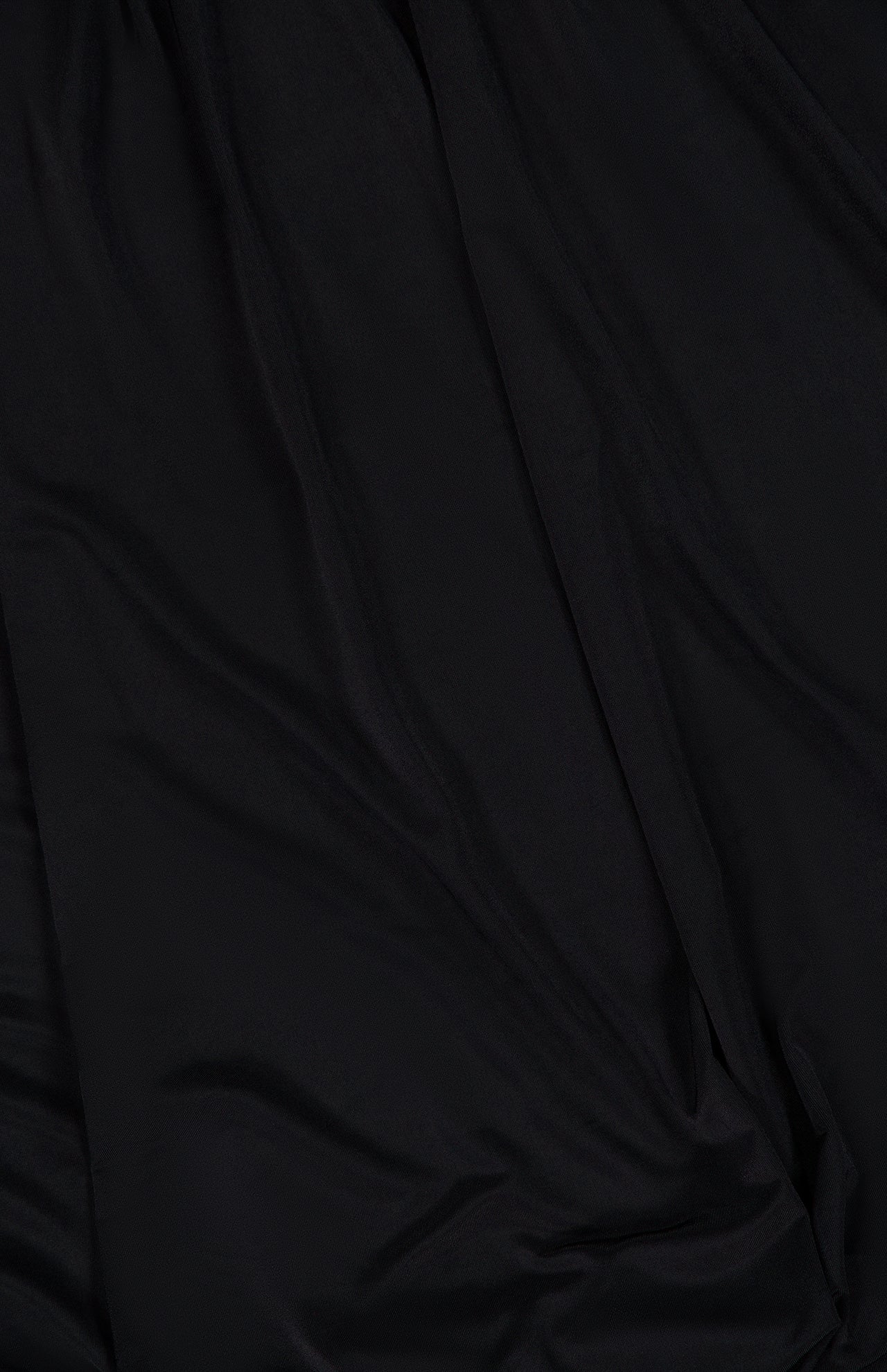 Experience the Martha Ruched Mini Dress by AMANDA UPRICHARD—crafted from smooth black fabric with soft, draped folds and gentle shadows for a flowing texture. The perfect sexy LBD to flatter every curve.