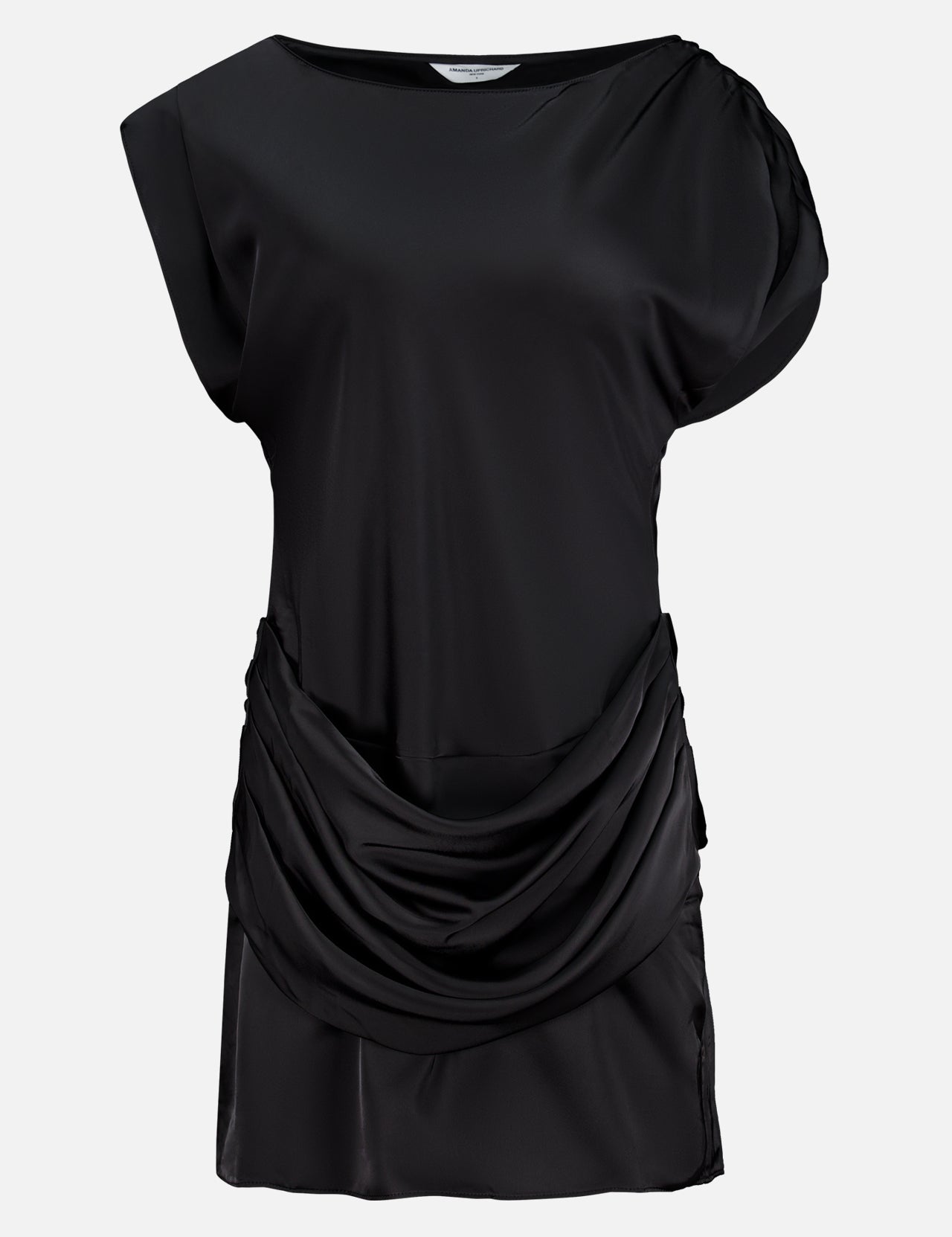 The Olandria Waist Bustle Mini Dress by AMANDA UPRICHARD is a black satin cocktail dress featuring a loose, draped cowl detail at the waist, short sleeves, and a simple round neckline, shown against a plain white background.