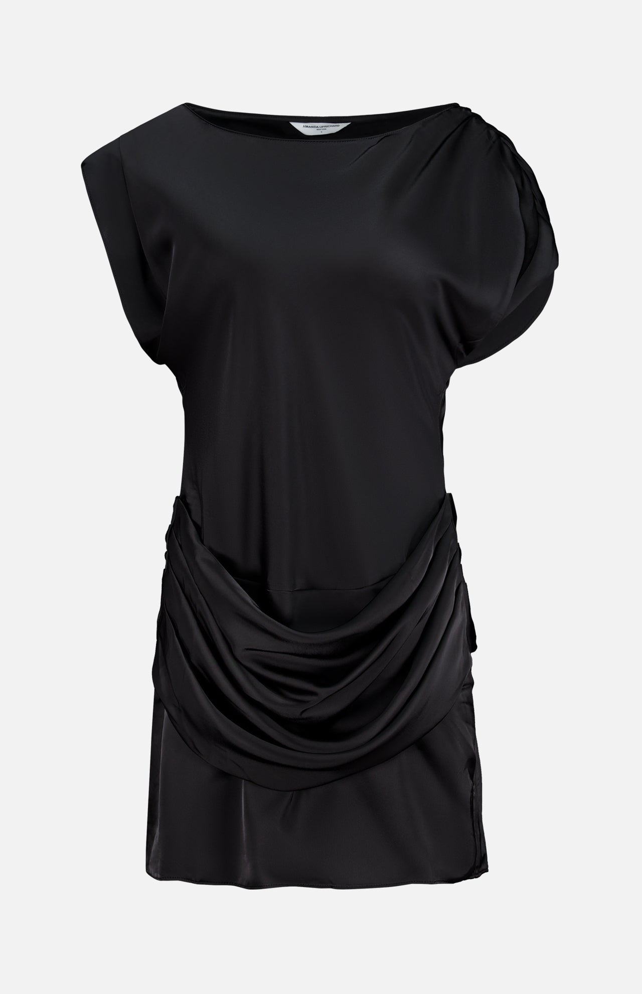 The Olandria Waist Bustle Mini Dress by AMANDA UPRICHARD is a black satin cocktail dress featuring a loose, draped cowl detail at the waist, short sleeves, and a simple round neckline, shown against a plain white background.