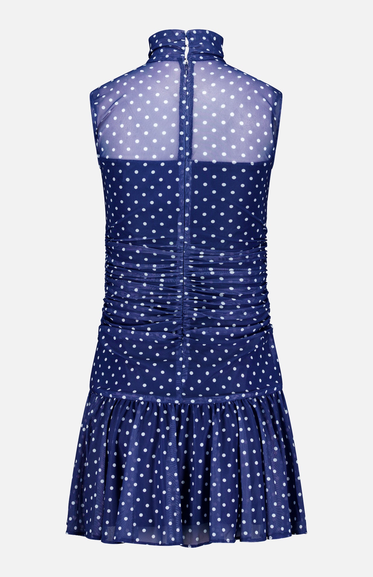 The Rumi Sleeveless Polka Dot Dress by AMANDA UPRICHARD features a navy blue mini silhouette with white polka dots, sheer high-neck bodice, ruching at the waist, back zipper, and a flared ruffled hem—perfect for a chic statement.