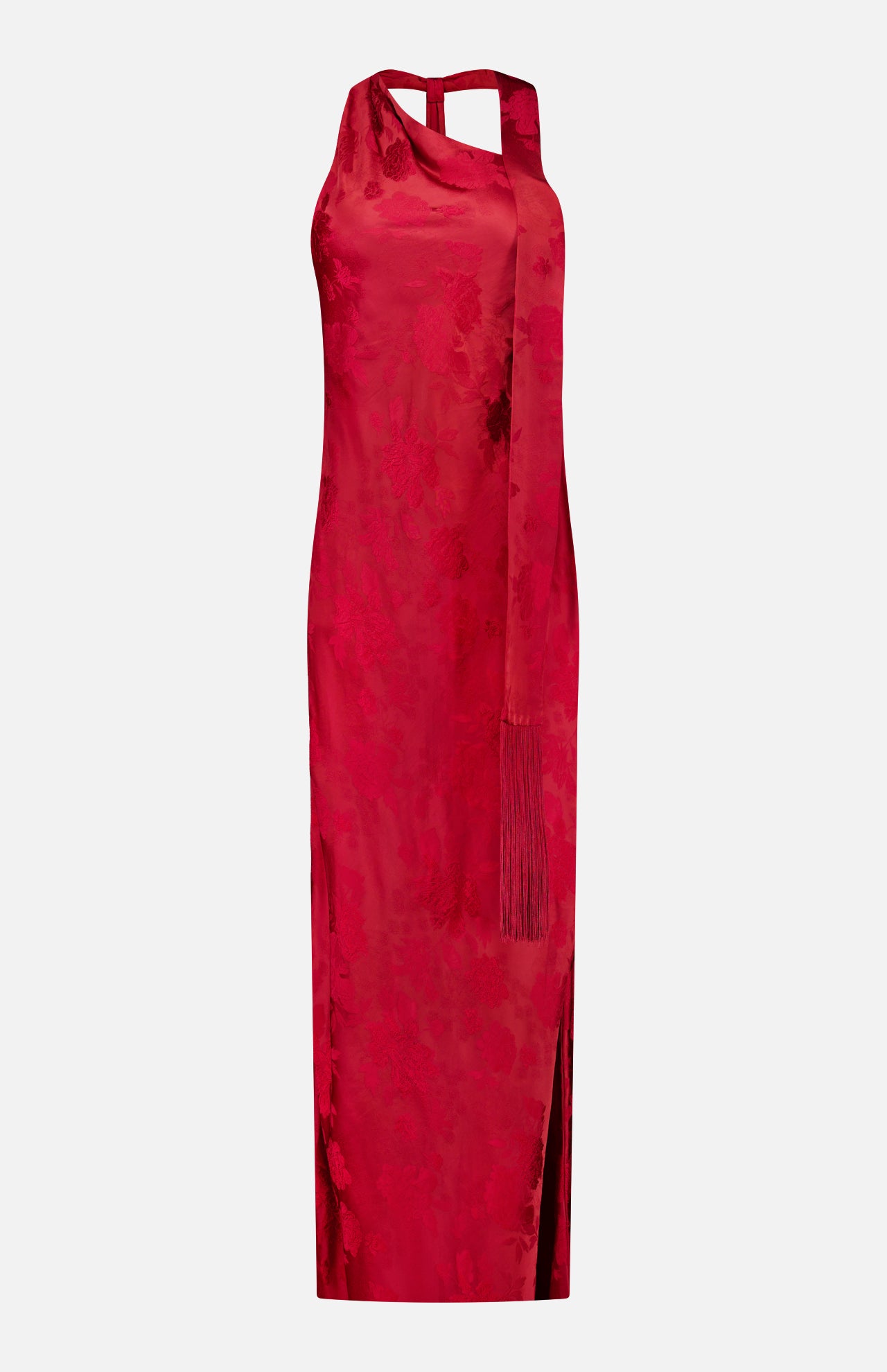 The Sonya Fringed Maxi Dress by AMANDA UPRICHARD is a sleeveless, dark red satin floral jacquard dress with a subtle pattern, high neckline, and a matching long scarf draped over one shoulder. This elegant maxi dress features a side slit and a fitted, ankle-length silhouette.