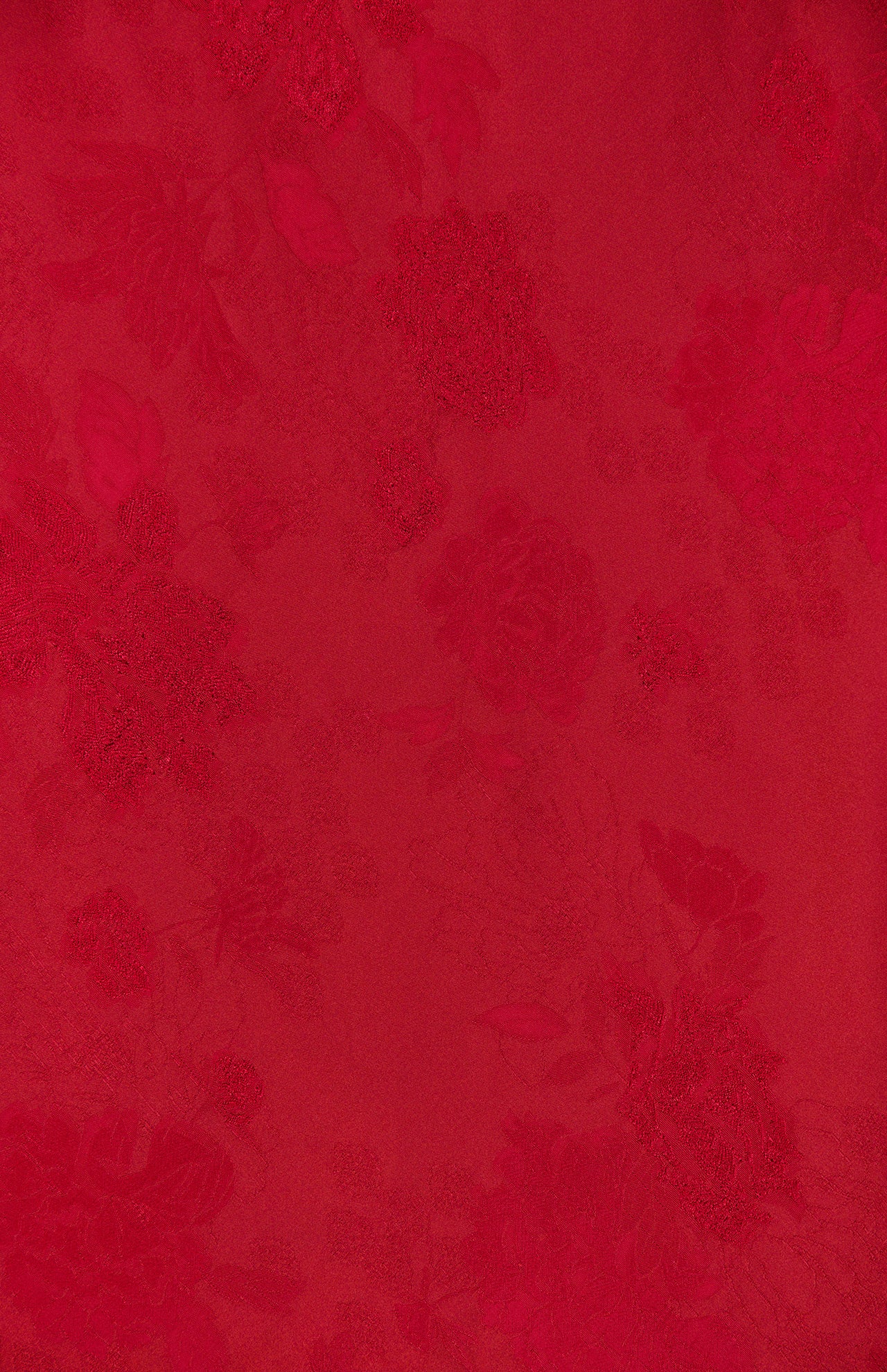 Crafted from luxurious red satin floral jacquard, the Sonya Fringed Maxi Dress by AMANDA UPRICHARD features a subtle, tone-on-tone pattern of roses and leaves. The fabric’s elegant texture and soft sheen make this dress a sophisticated choice for any occasion.