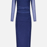 The Zoey Polka Dot Midi Dress by AMANDA UPRICHARD features navy mesh with white polka dots, a sheer neckline, fitted silhouette, long sleeves, and a keyhole back closure for elegant modern style.