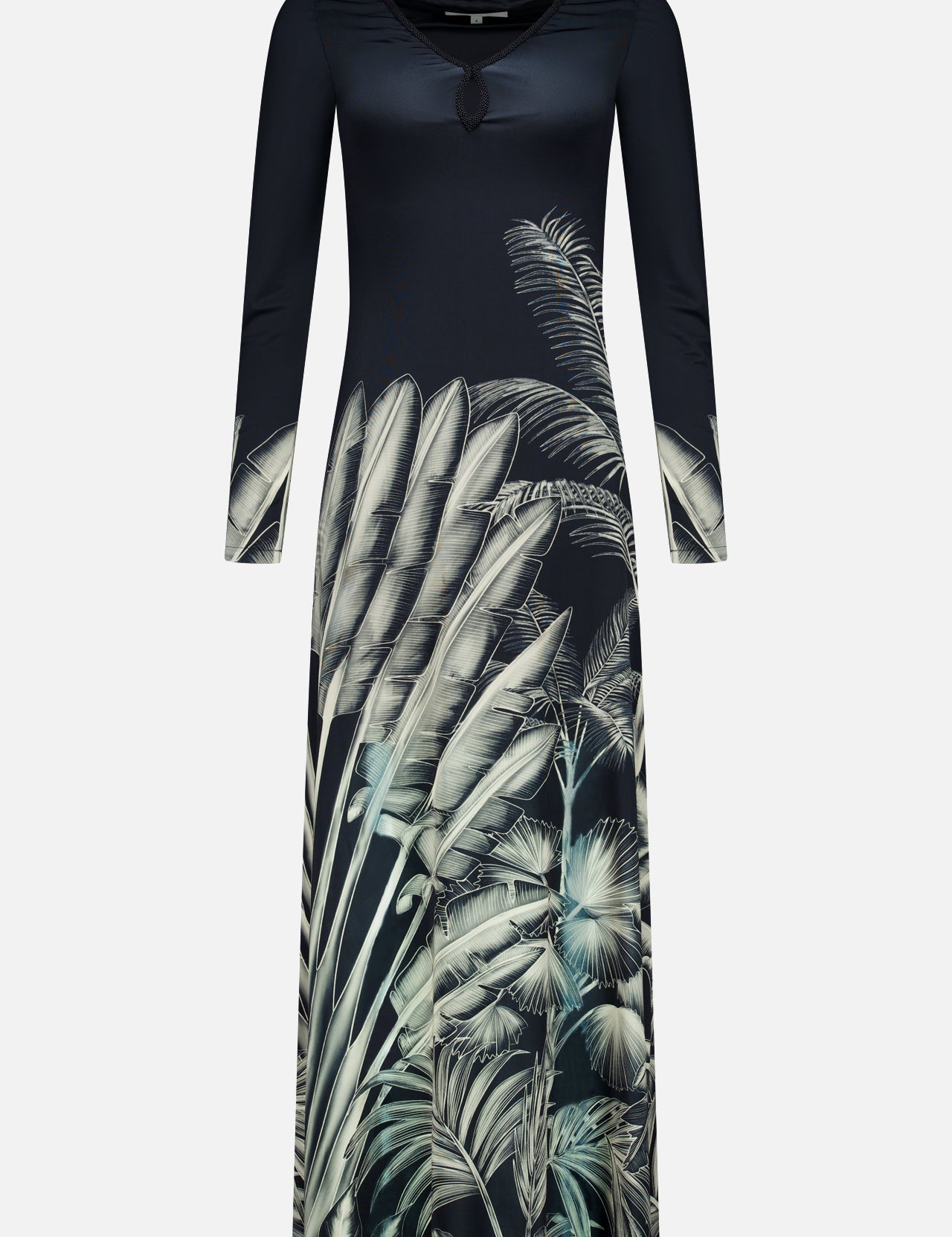 The Donde Empieza Embellished Maxi Dress by ANDRÉS OTÁLORA is a long-sleeved black dress with a round neckline, beaded keyhole detail, and a botanical palm print featuring grey and green tropical leaves on the lower half and sleeves.