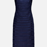 The Eterna Brisa Embroidered Midi Dress by ANDRÉS OTÁLORA is a sleeveless navy dress featuring thin adjustable straps and horizontal sheer panel detailing.