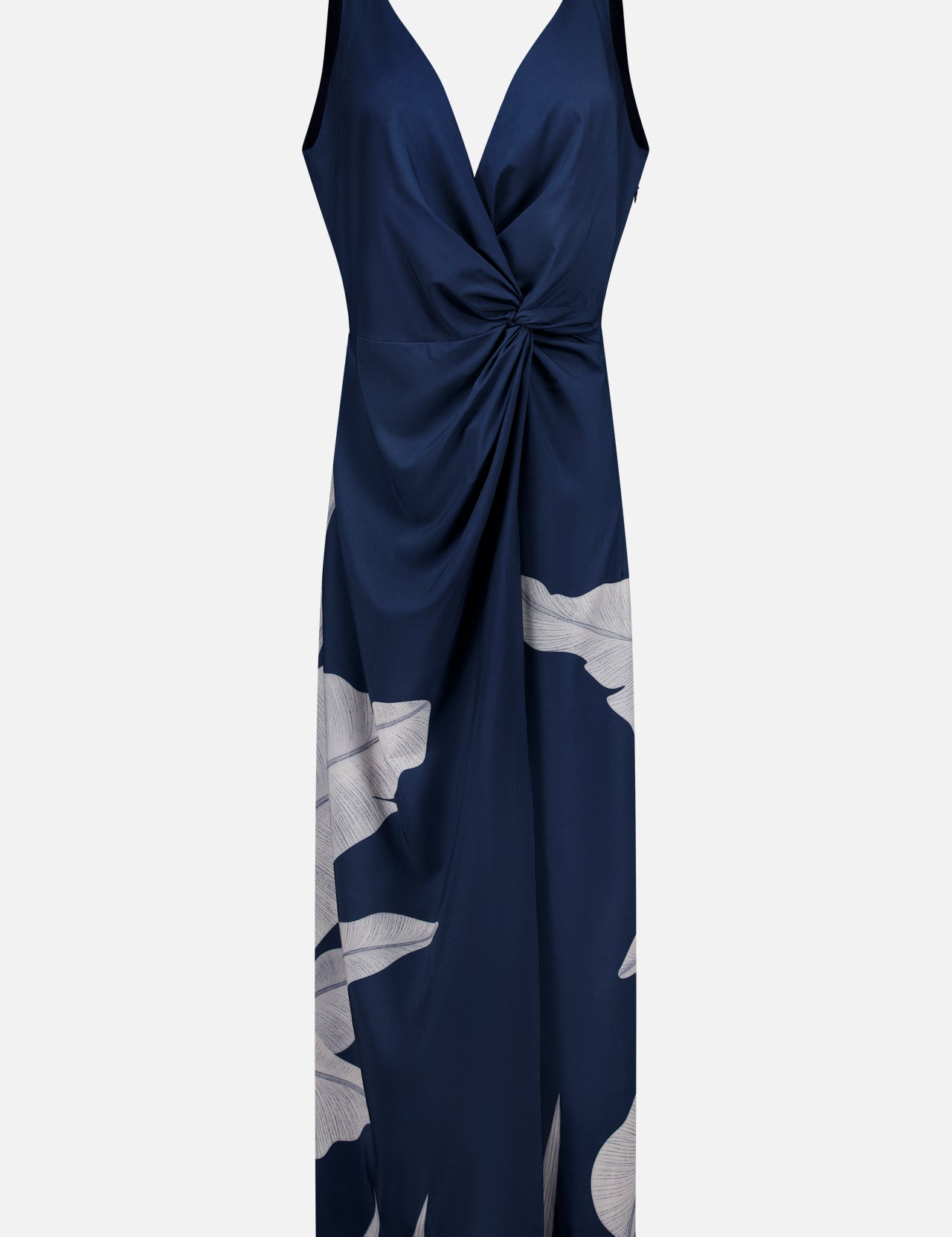 The Paradiso Botanical Maxi Dress by ANDRÉS OTÁLORA is a sleeveless Mediterranean-inspired dress in midnight navy, featuring a deep V-neck, gathered twist waist, and white abstract florals at the hem and side.