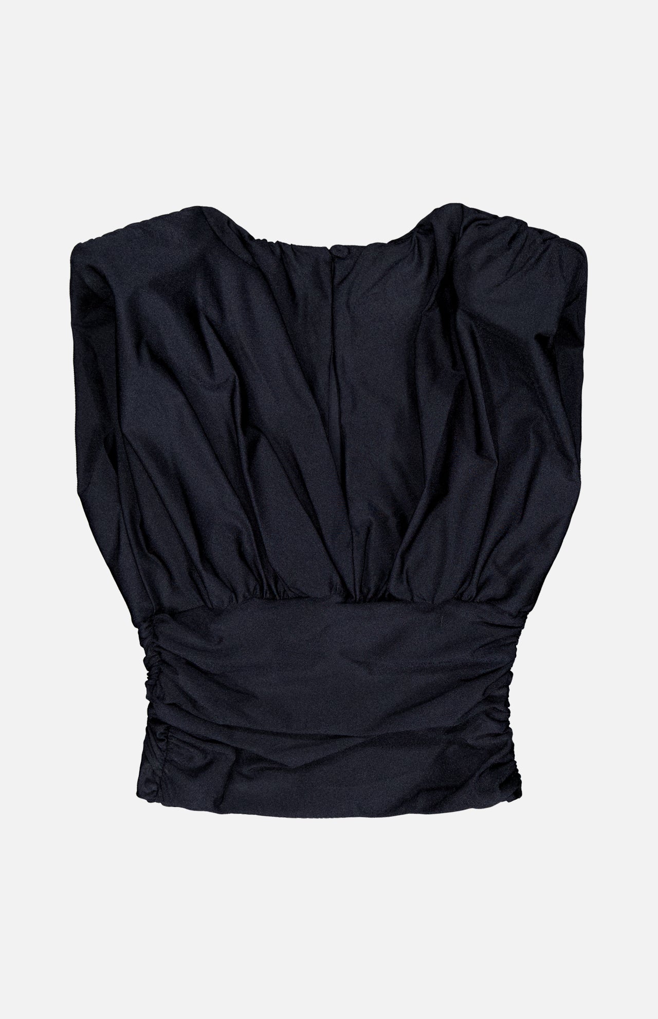 The ANDRÉS OTÁLORA Tan Lejos Top is a sleeveless black blouse with a wide neckline and gathered waist, shown flat on a white background.