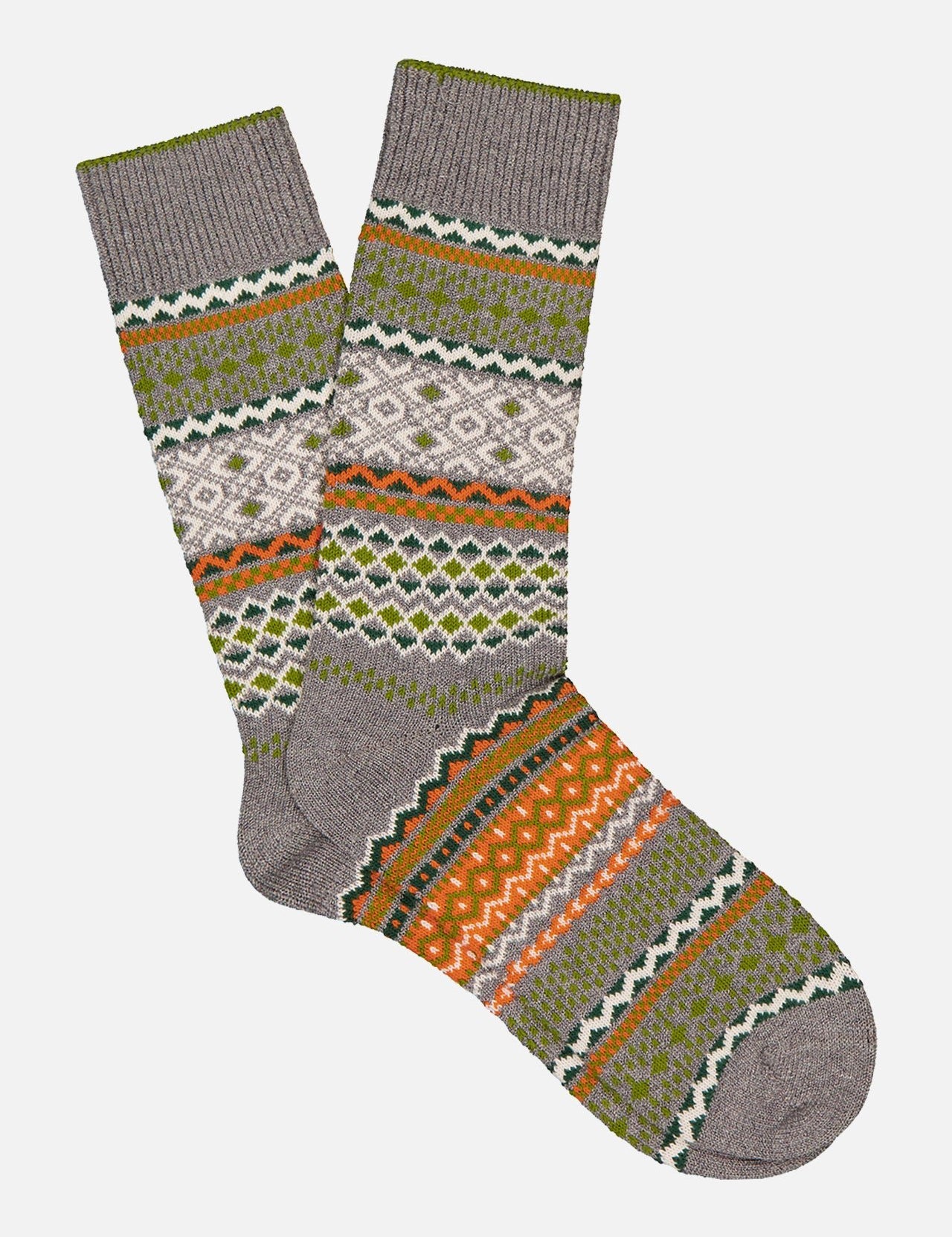 The ANT45 Corvara Sock is a grey and green pair featuring geometric and zigzag patterns in gray, green, orange, and white, inspired by bold Aztec stripes.