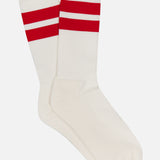 ANT45's Bernera Short Socks feature a classic design with two bold red stripes near the top. These white cotton socks are laid flat against a white background, highlighting their timeless appeal.