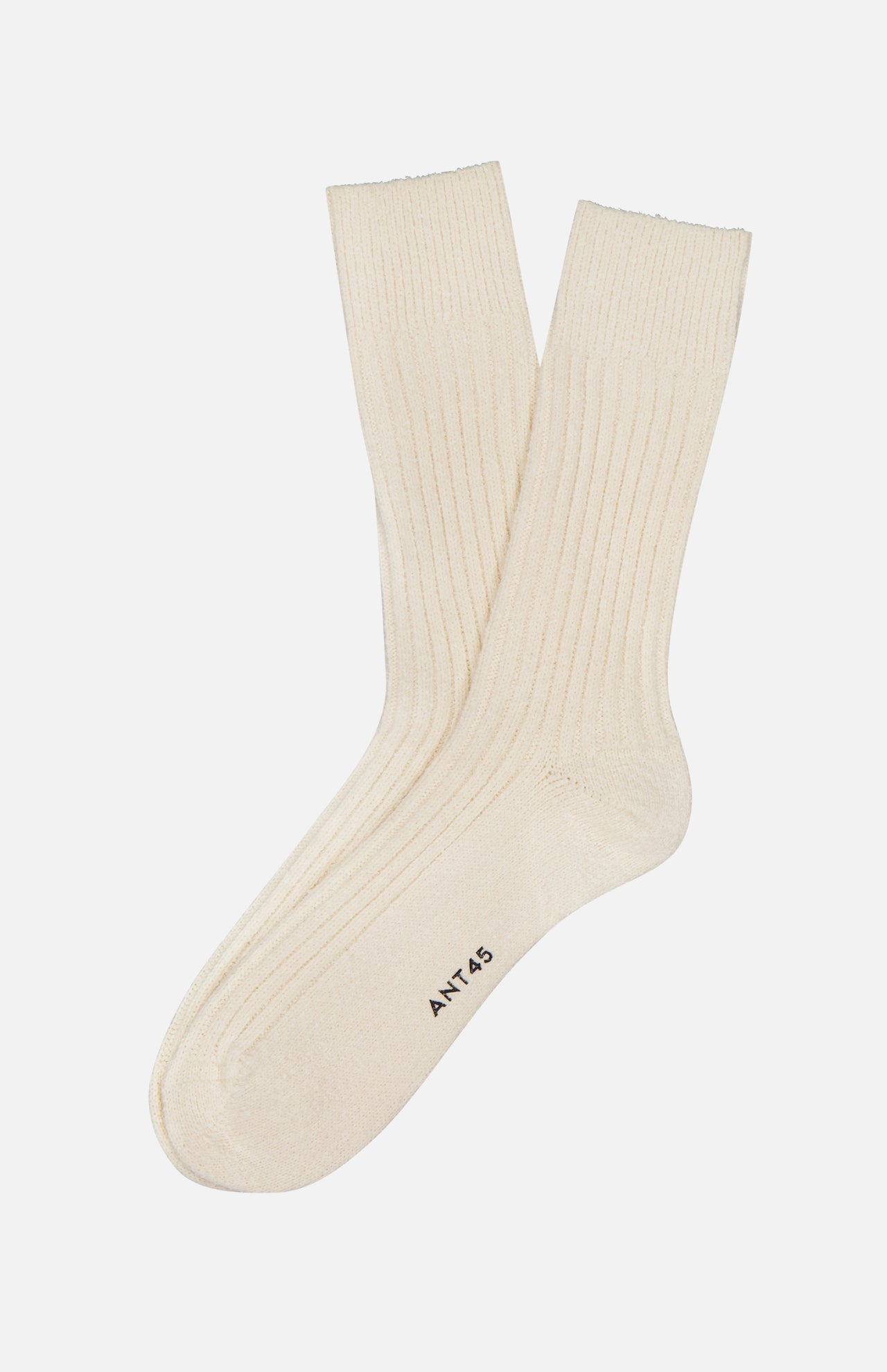 A pair of cream Blog Short Socks by ANT45, featuring a ribbed design, are laid flat and crossed on a plain white background. One sock displays "45" and "ANT" near the toe area.