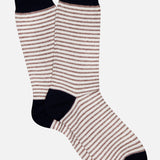 The ANT45 Midett Short Socks feature thin brown and white cotton-linen stripes with solid black toes, heels, and cuffs, shown on a plain white background.