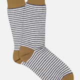 The ANT45 Midett Short Socks feature navy blue and white horizontal stripes with solid brown cuffs, heels, and toes. Displayed on a white background.