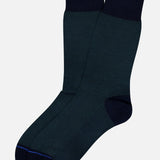 Oxford Short Socks by ANT45: dark green dress socks with black toes, heels, and cuffs, made from mercerized cotton in Italy. Displayed on a plain white background.