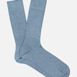 A pair of ANT45 Sable Short Socks in light blue, featuring a ribbed crew design, are laid flat on a white background with one sock slightly overlapping the other.