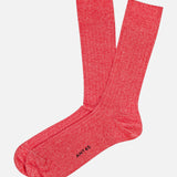 A pair of Sable Short Socks by ANT45 in bright pink are laid flat on a white background, with ART 45 printed in black near the toe of one sock.