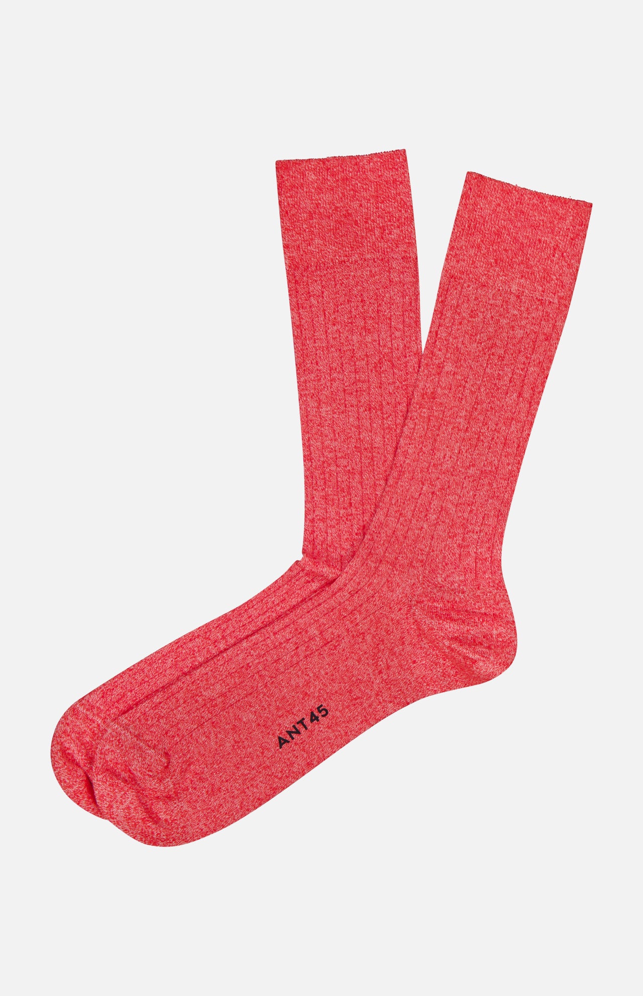 A pair of Sable Short Socks by ANT45 in bright pink are laid flat on a white background, with ART 45 printed in black near the toe of one sock.