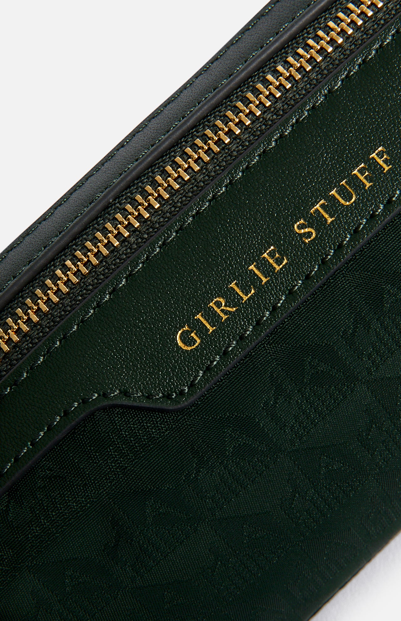 Dark green jacquard nylon Logo Girlie Stuff Pouch featuring the words GIRLIE STUFF embossed in gold lettering.