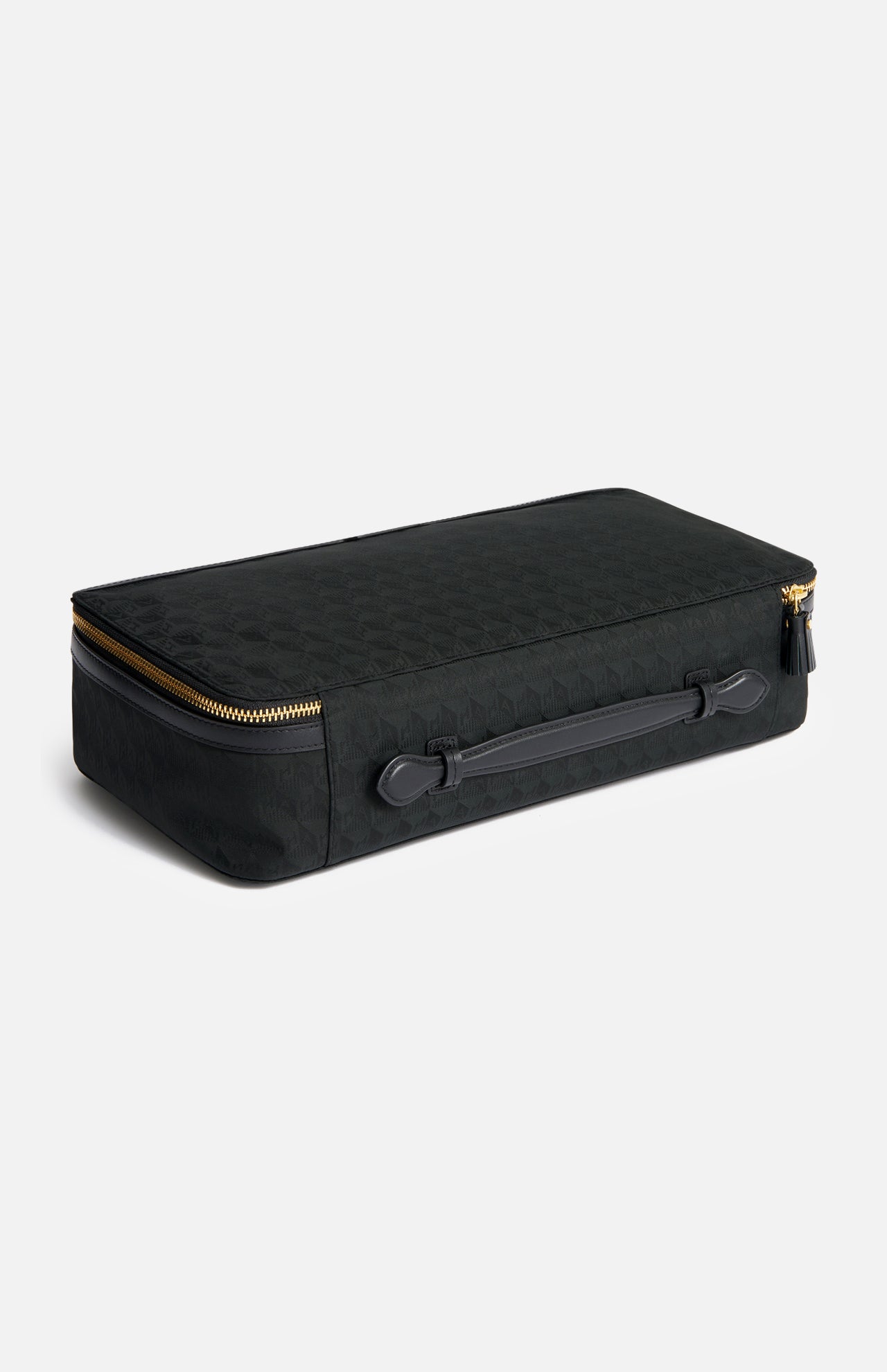 Anya Hindmarch Logo Hair Kit Travel Pouch, a black rectangular hair tools organizer with a top handle and a gold-tone wraparound zipper.