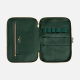 Open dark green Anya Hindmarch Logo Vanity Kit with a zippered closure and interior slots and pockets labeled TOOLS.