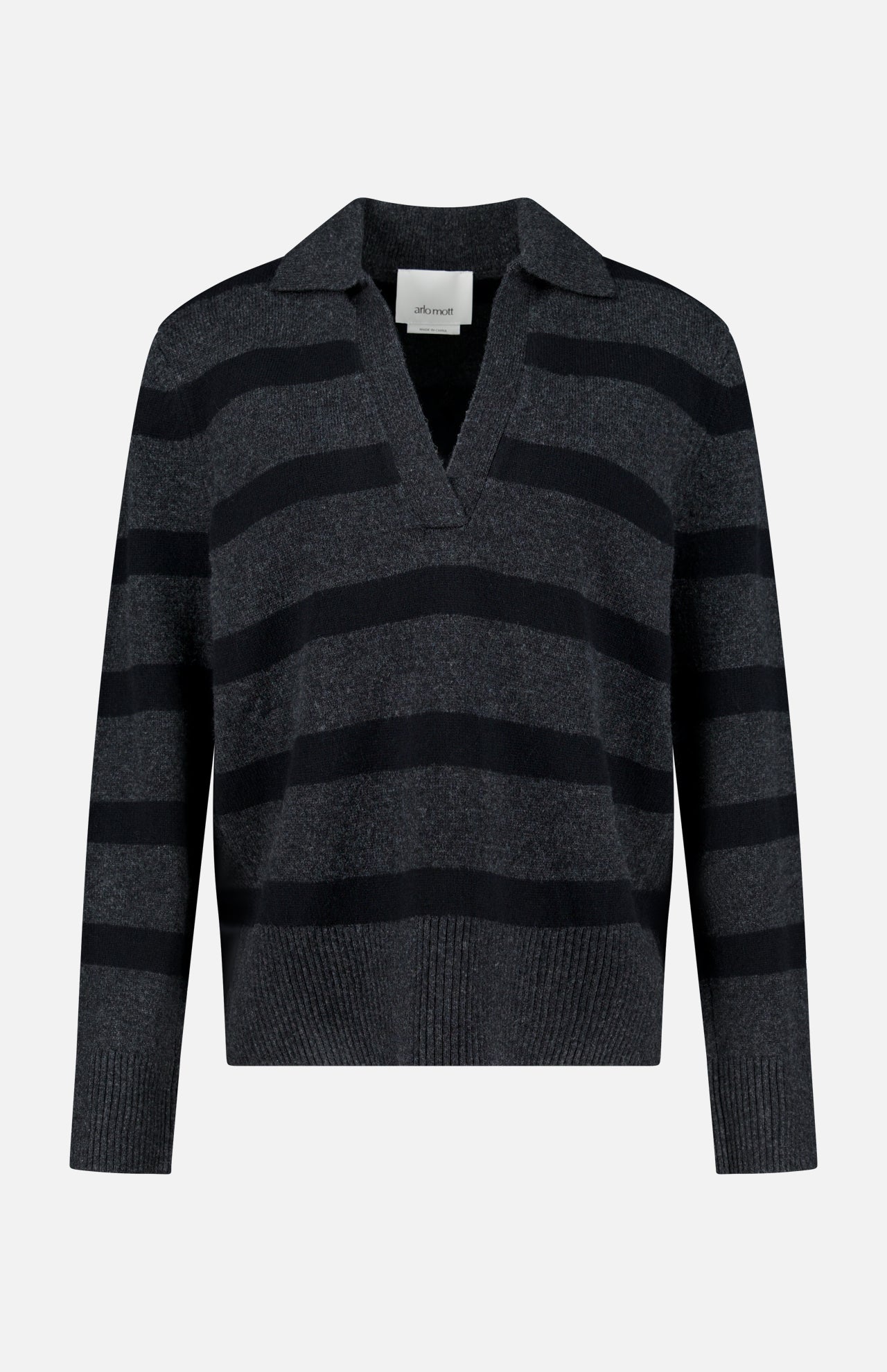 The Allen Wool Cashmere Oversized Sweater by ARLO MOTT features wide black horizontal stripes on a dark gray background, complemented by a V-neckline and collar. This charcoal stripe sweater is shown against a plain white backdrop.