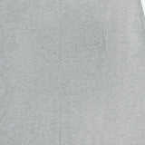 Close-up of the ARLO MOTT Beekman Maxi Skirt in pale grey, featuring a minimalist design with a subtle center seam and a small top zipper.