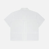 Back view of the ARLO MOTT Clark Split Back Top, a white poplin shirt with short sleeves, collar, visible seams, Mother of Pearl buttons, and a boxy loose fit shown against a plain white background.