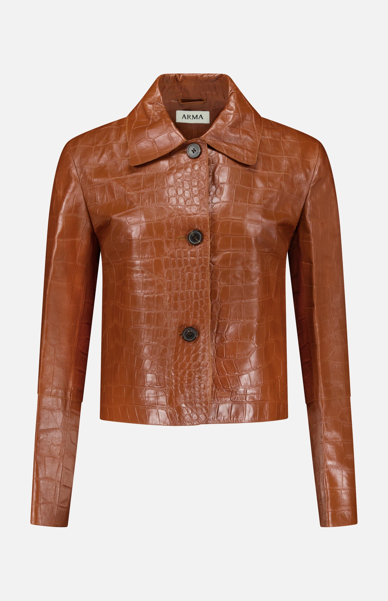 The Emy Lamb Nappa Print Coat by ARMA features a brown crocodile-print leather design with long sleeves, three dark buttons on the front, and a wide collar. The interior displays the ARMA brand label inside the collar. The coat is photographed against a plain white background.