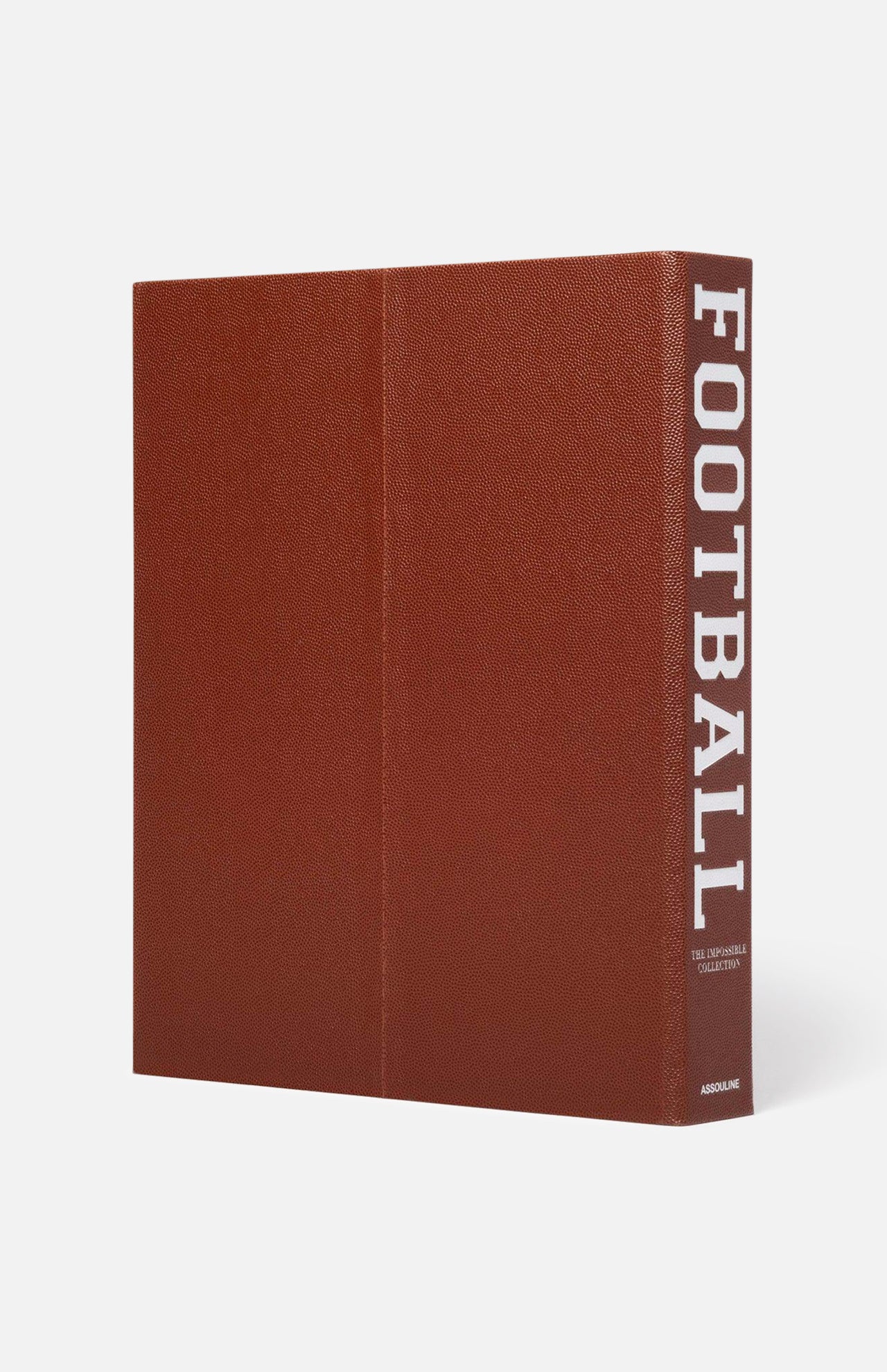 The ASSOULINE Football: The Impossible Collection is a large brown hardcover book with a textured football-like cover and bold white “FOOTBALL” on the spine—an ideal collector’s piece for college football or NFL history fans.