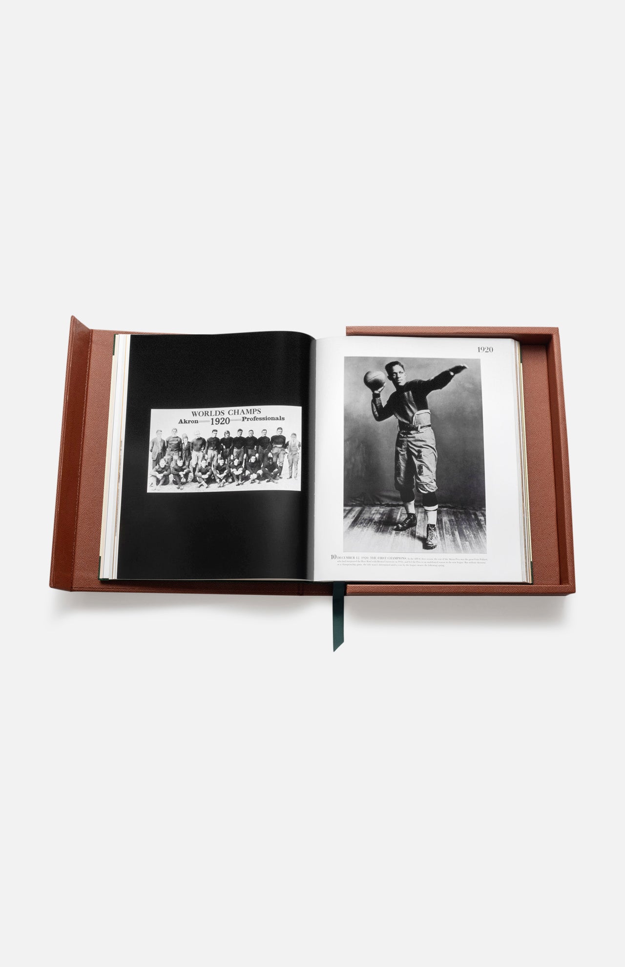 ASSOULINE's "Football: The Impossible Collection" showcases an open book in a brown case with a black-and-white group photo on the left and a vintage college football player in uniform on the right, set against a white background.