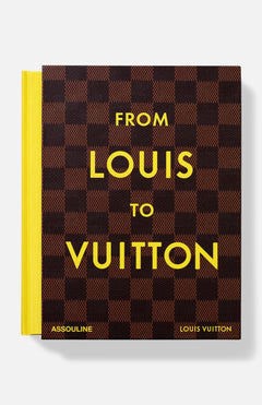 The From Louis to Vuitton Book by ASSOULINE features a brown checkered cover, yellow spine, bold yellow lettering, and the publisher’s name at the bottom.
