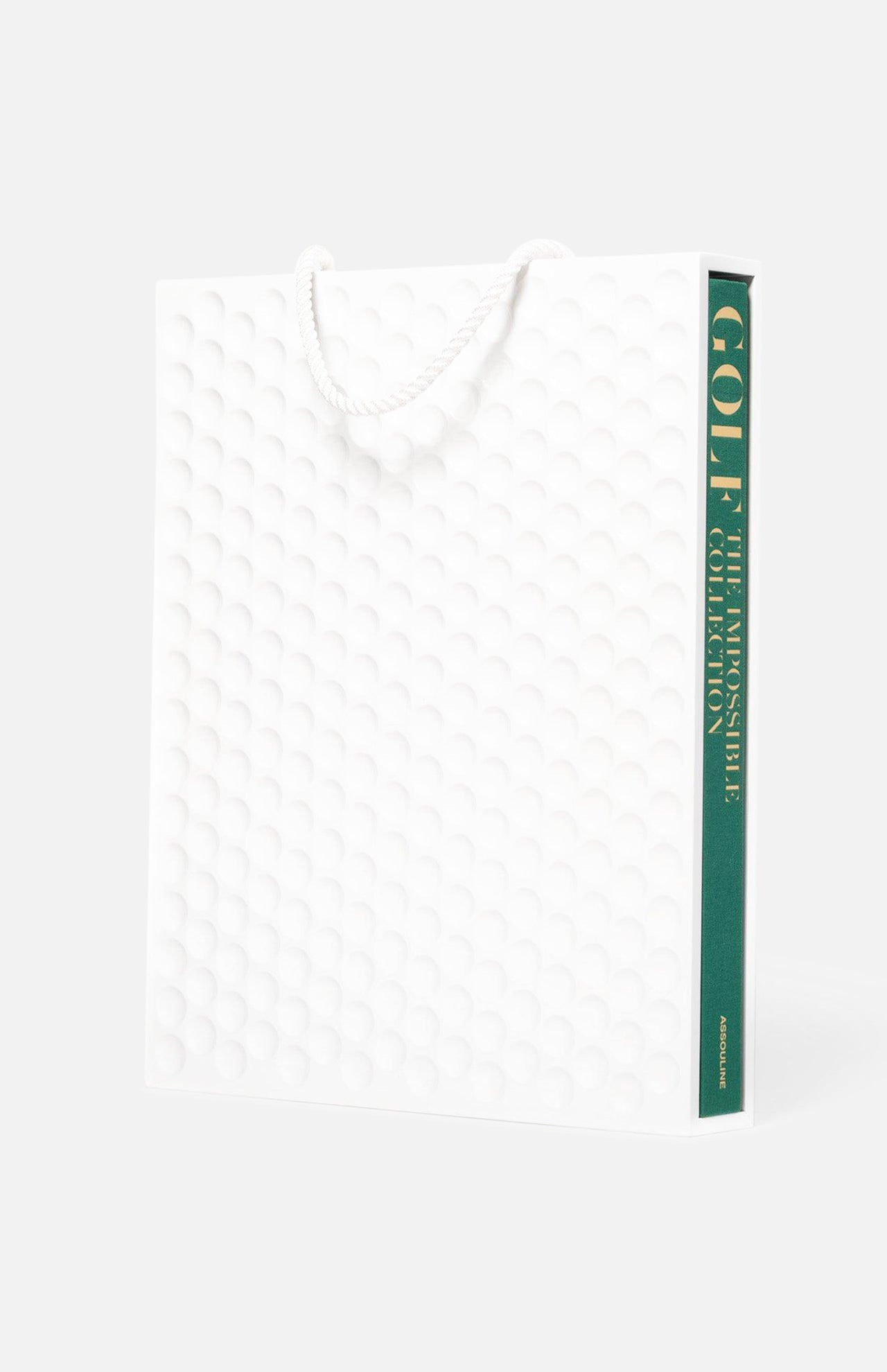 Golf: The Impossible Collection by ASSOULINE is a large white book with a textured dimpled cover, white rope handle, and green and gold spine text. Part of the Assouline Ultimate Collection.