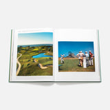 An open copy of Golf: The Impossible Collection by ASSOULINE shows an aerial golf course photo on the left and a group of golfers with caddies on a green under a blue sky—an essential coffee table book for golf lovers.