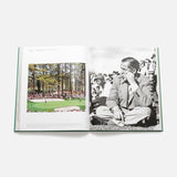 An open copy of ASSOULINE’s Golf: The Impossible Collection displays a color golf match photo on the left page and a black-and-white image of a suited man in a crowd on the right, both pages featuring text above the images.