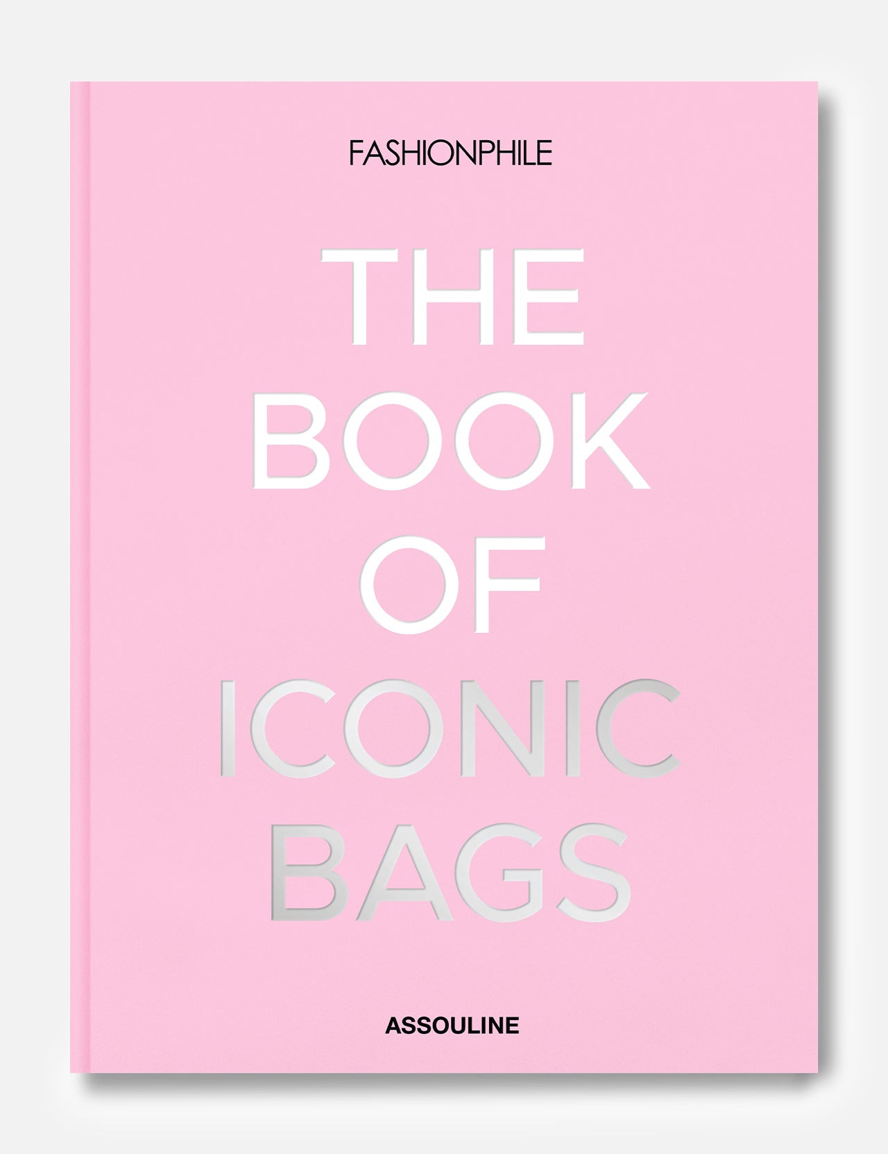 Fashionphile: The Book of Iconic Bags by ASSOULINE is a pink hardcover celebrating luxury handbags, with the title in bold white and silver on the cover—a perfect guide to iconic investment bags.