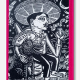 Assouline’s "The Art of Tequila: Spirit of Mexico Book" features black and white art of a man in a sombrero with a drink, beside a wolf labeled "Mexico," surrounded by stars, plants, moon, and framed with a bright pink border.