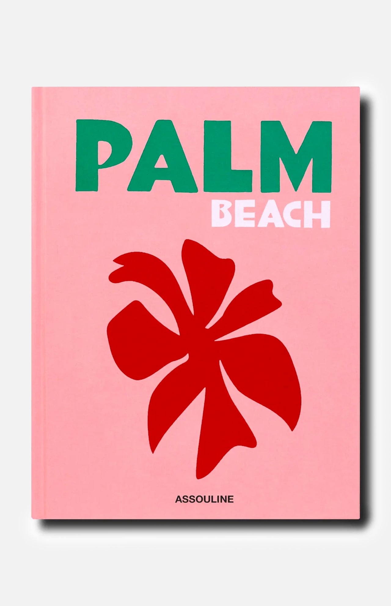 A pink book cover titled “Palm Beach” by ASSOULINE—featuring PALM in green, BEACH in light pink, a bold red flower illustration, and the brand name ASSOULINE in black at the bottom—captures the vibrant spirit of Palm Beach as an iconic luxury resort destination and exclusive community.