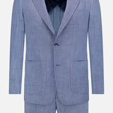 The ATELIER MUNRO Melange Wool Silk and Linen Suit in light blue features a two-button single-breasted blazer with notch lapels and two front patch pockets, paired with matching trousers, shown against a plain white background.