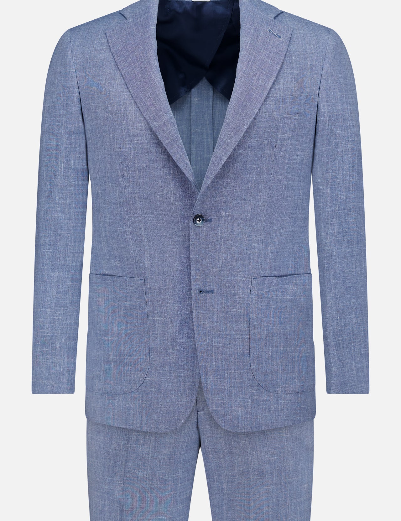 The ATELIER MUNRO Melange Wool Silk and Linen Suit in light blue features a two-button single-breasted blazer with notch lapels and two front patch pockets, paired with matching trousers, shown against a plain white background.